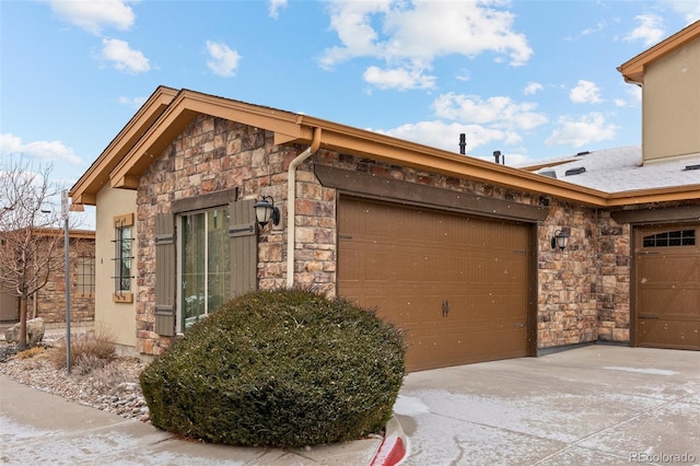 view of property exterior featuring a garage