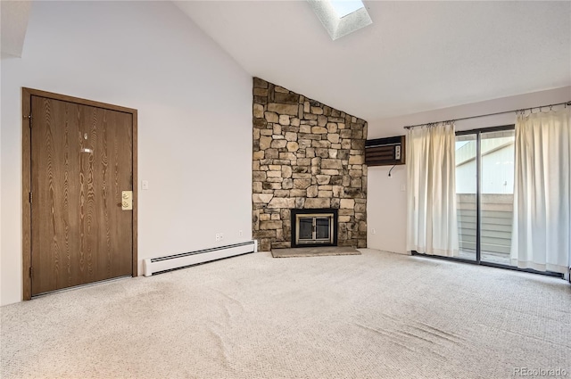 unfurnished living room with baseboard heating, a skylight, carpet, a stone fireplace, and an AC wall unit