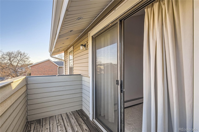 balcony featuring baseboard heating