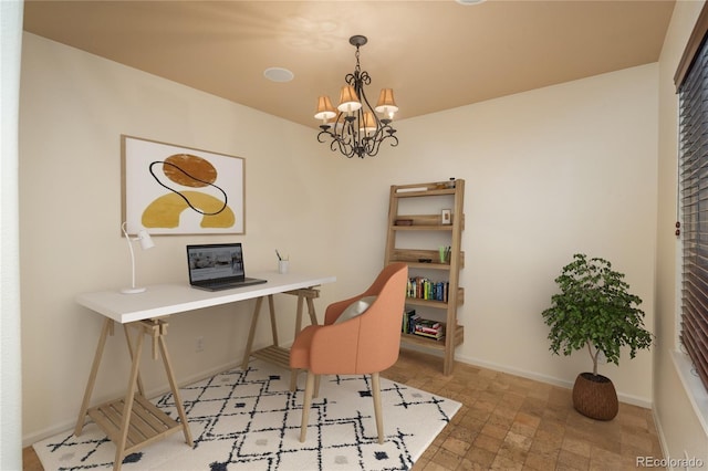 home office featuring a chandelier