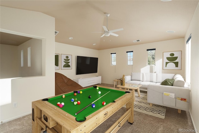 recreation room with ceiling fan, carpet, and a healthy amount of sunlight