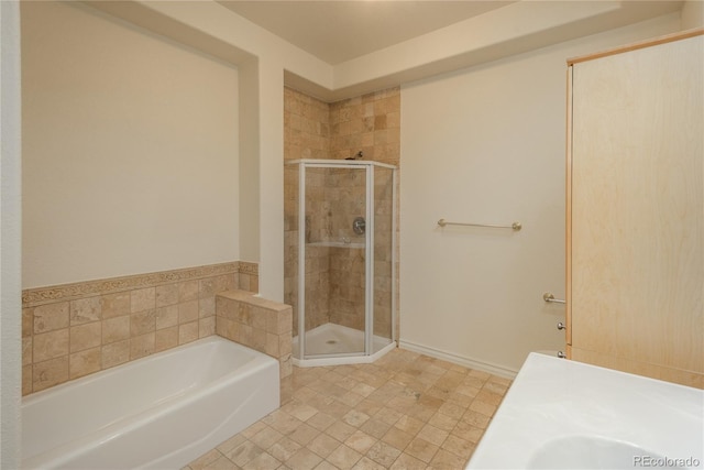 bathroom featuring plus walk in shower