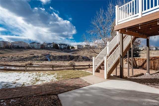 view of yard with a patio area and a wooden deck