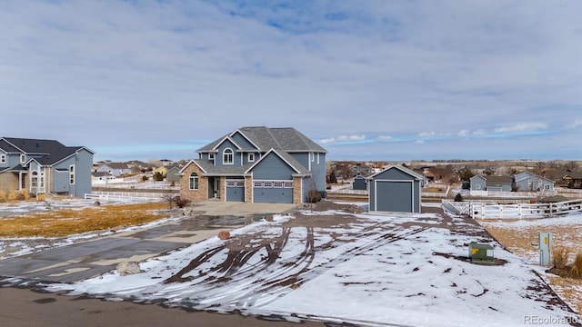 view of front of property with a garage and a residential view