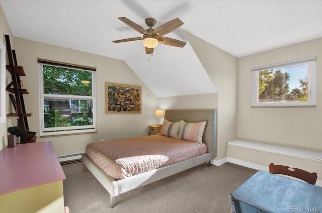 bedroom featuring a baseboard heating unit, multiple windows, carpet, and vaulted ceiling