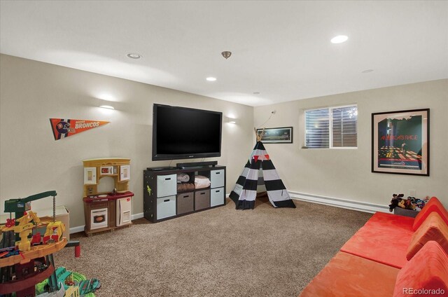 game room featuring a baseboard radiator, carpet flooring, baseboards, and recessed lighting