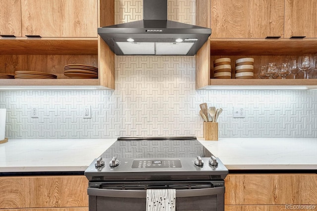 kitchen featuring decorative backsplash, wall chimney exhaust hood, and stainless steel electric range