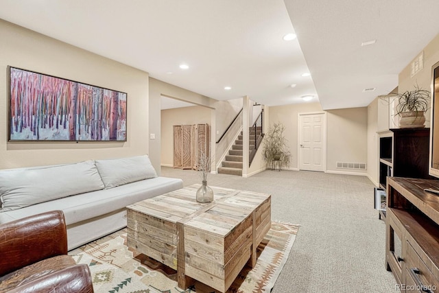 living room with light colored carpet