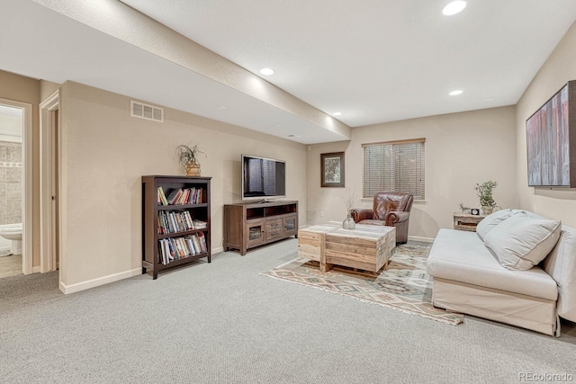 living room featuring light colored carpet