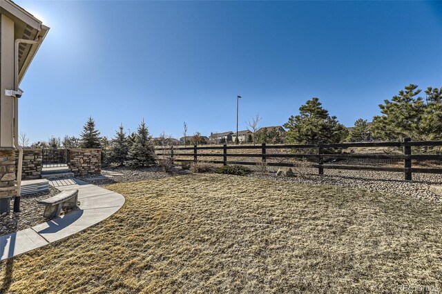 view of yard featuring fence