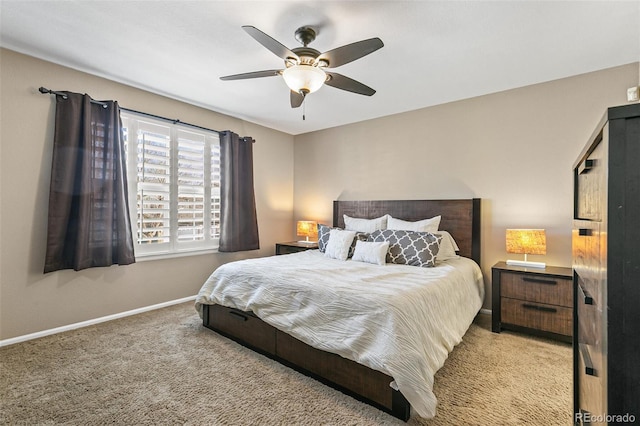 bedroom featuring baseboards, carpet flooring, and ceiling fan