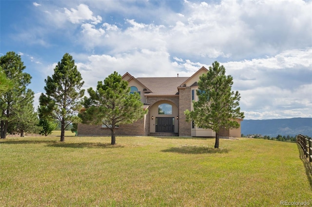 1680 Elk View Rd, Larkspur, CO 80118 - view of front facade featuring a front lawn