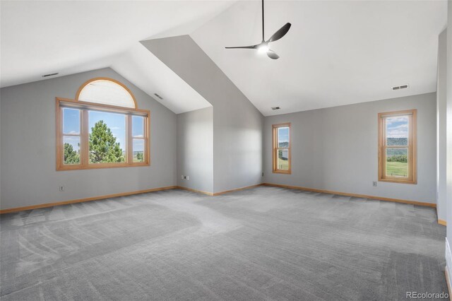 1680 Elk View Rd, Larkspur, CO 80118 - carpeted spare room featuring ceiling fan, healthy amount of natural light, and vaulted ceiling