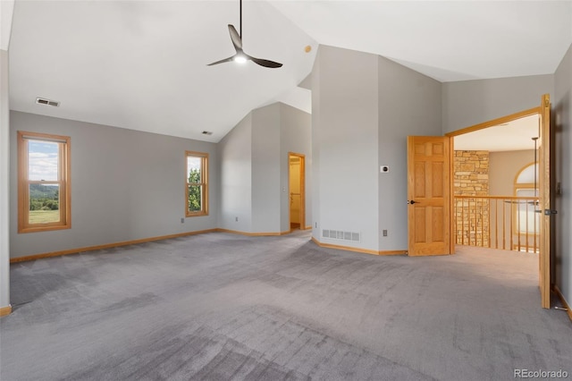 1680 Elk View Rd, Larkspur, CO 80118 - spare room with ceiling fan, carpet floors, high vaulted ceiling, and healthy amount of natural light