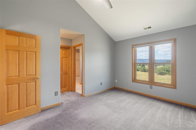 1680 Elk View Rd, Larkspur, CO 80118 - spare room with carpet flooring and lofted ceiling