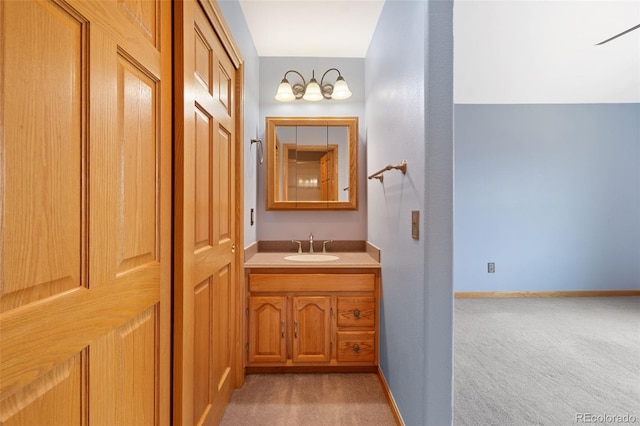 1680 Elk View Rd, Larkspur, CO 80118 - bathroom with vanity and baseboards