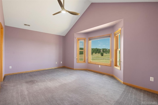 1680 Elk View Rd, Larkspur, CO 80118 - empty room featuring ceiling fan, carpet, vaulted ceiling, and healthy amount of natural light