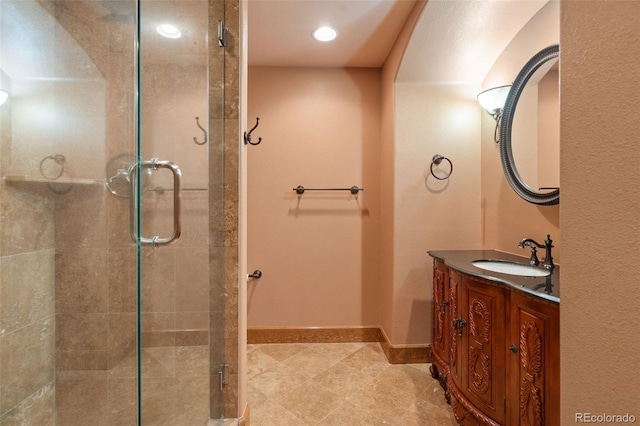 1680 Elk View Rd, Larkspur, CO 80118 - full bath featuring a shower stall, vanity, tile patterned floors, and recessed lighting