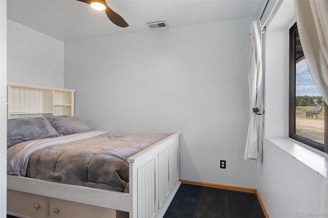 1680 Elk View Rd, Larkspur, CO 80118 - bedroom featuring carpet and a ceiling fan