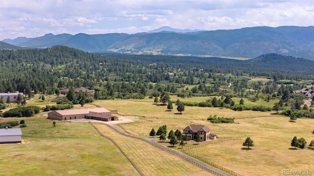 1680 Elk View Rd, Larkspur, CO 80118 - aerial view of sparsely populated area featuring mountains and a forest