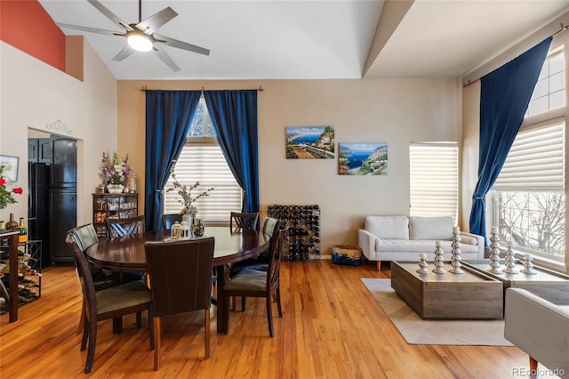 dining area featuring plenty of natural light, light wood-style flooring, and a ceiling fan