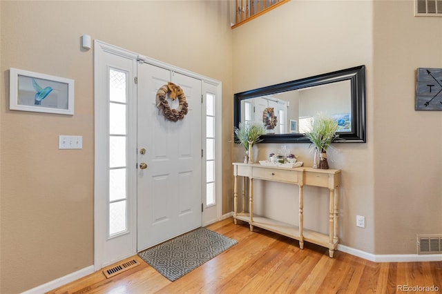 13277 Elizabeth St, Thornton, CO 80241 - entryway with wood finished floors and baseboards