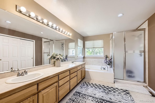 13277 Elizabeth St, Thornton, CO 80241 - full bath with double vanity, a garden tub, and a shower stall