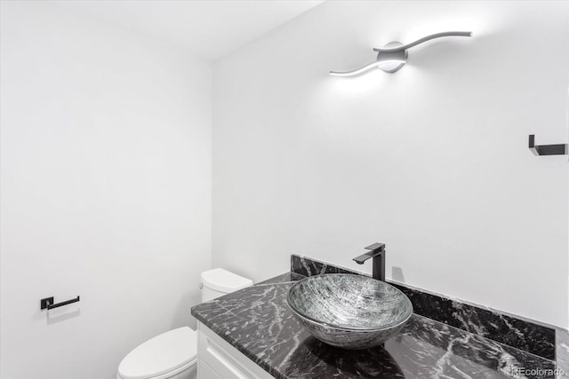 7916 Cozart Ln, Salida, CO 81201 - half bath featuring vanity and marble finish flooring