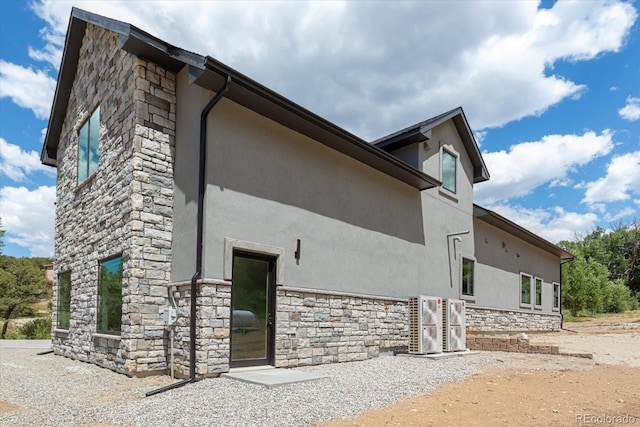 7916 Cozart Ln, Salida, CO 81201 - view of property exterior with stone siding and stucco siding