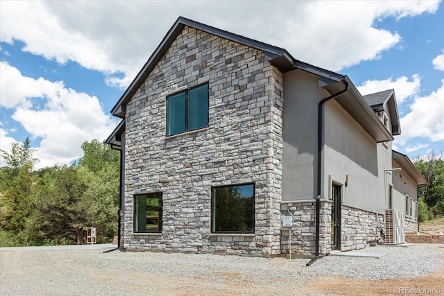 7916 Cozart Ln, Salida, CO 81201 - view of side of property with stone siding and stucco siding