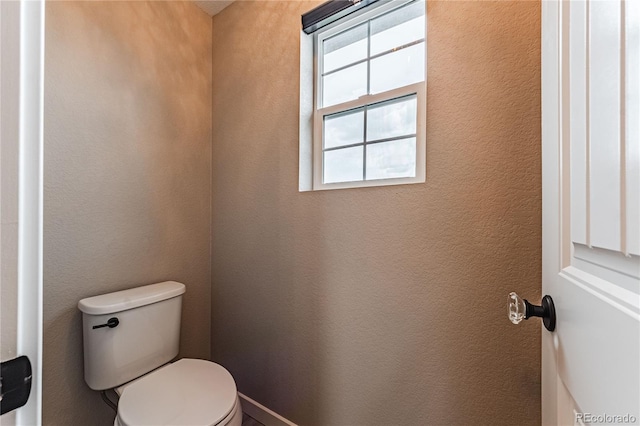 bathroom featuring toilet