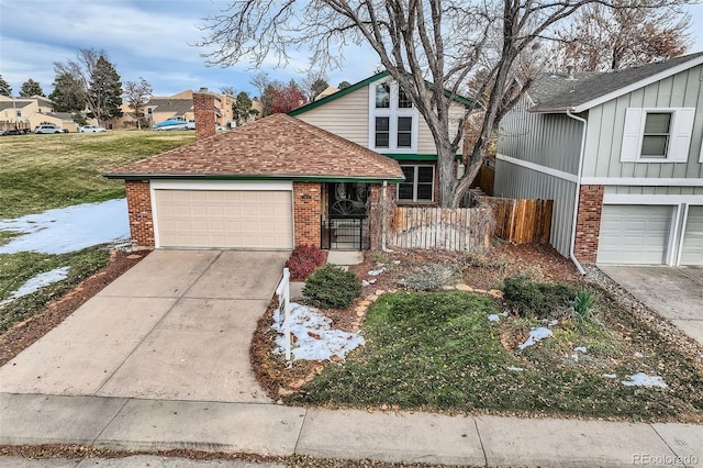 view of front of property featuring a front lawn, covered porch, and a garage