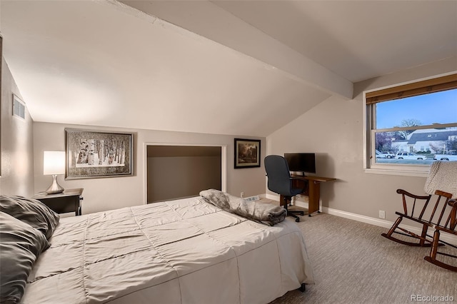 carpeted bedroom featuring vaulted ceiling