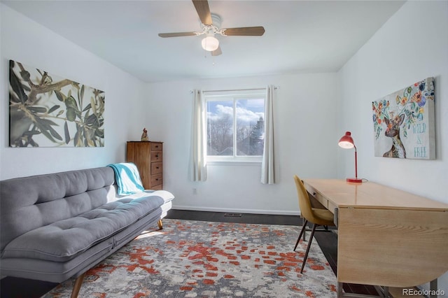 office with baseboards and a ceiling fan