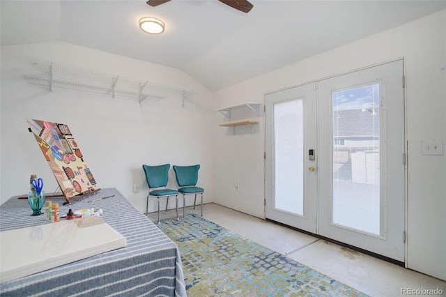 bedroom with lofted ceiling and french doors