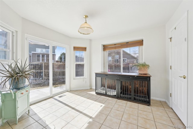 view of unfurnished sunroom