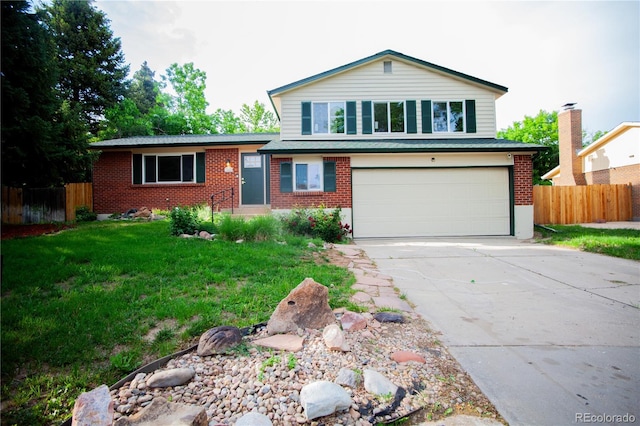 1552 S Fairplay Way, Aurora, CO 80012 - view of front of home featuring a garage, brick siding, and driveway