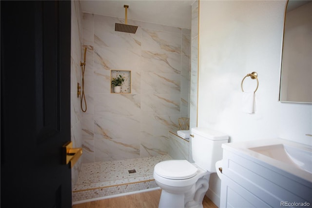 1552 S Fairplay Way, Aurora, CO 80012 - full bathroom with vanity, a marble finish shower, and wood finished floors