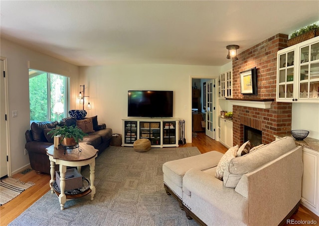 15674 Greenstone Cir, Parker, CO 80134 - living room with a fireplace and wood finished floors