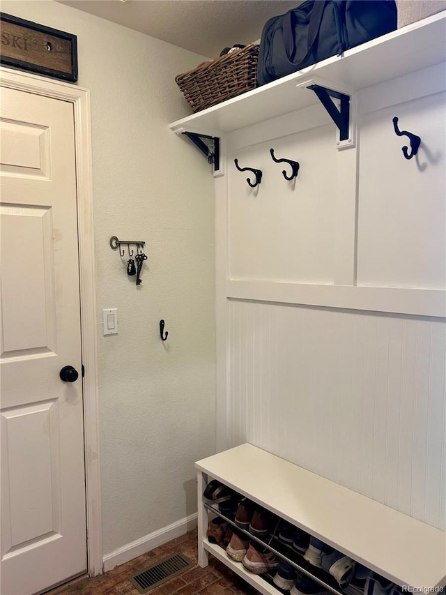 15674 Greenstone Cir, Parker, CO 80134 - mudroom featuring baseboards