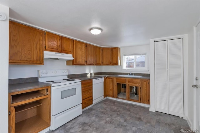 kitchen with white appliances and sink