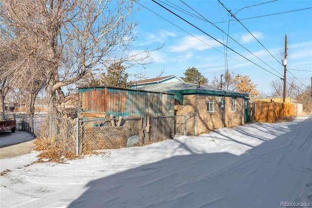 view of snow covered property