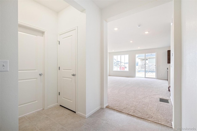 20630 E 58th Ave, Aurora, CO 80019 - hallway with carpet flooring, recessed lighting, baseboards, and tile patterned flooring