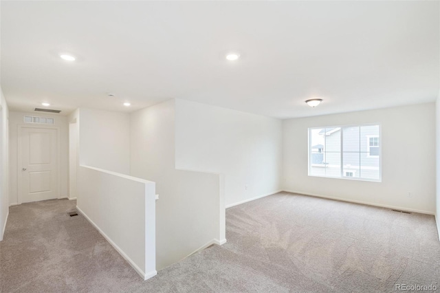 20630 E 58th Ave, Aurora, CO 80019 - empty room with carpet flooring, baseboards, and recessed lighting