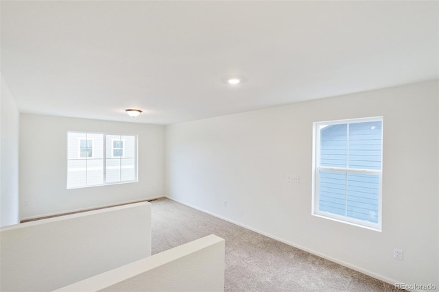 20630 E 58th Ave, Aurora, CO 80019 - unfurnished room featuring light carpet and baseboards