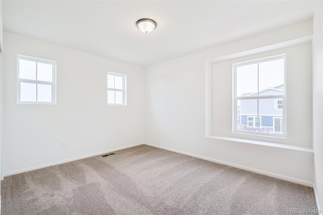 20630 E 58th Ave, Aurora, CO 80019 - empty room featuring carpet floors and baseboards