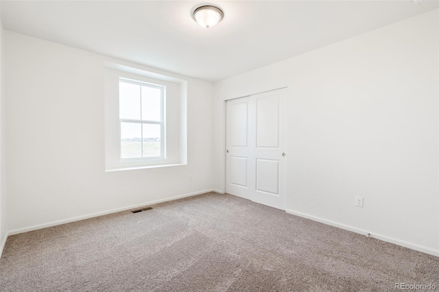 20630 E 58th Ave, Aurora, CO 80019 - spare room with carpet and baseboards
