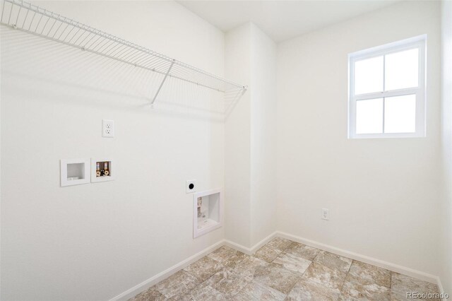 20630 E 58th Ave, Aurora, CO 80019 - laundry area featuring electric dryer hookup, washer hookup, and baseboards