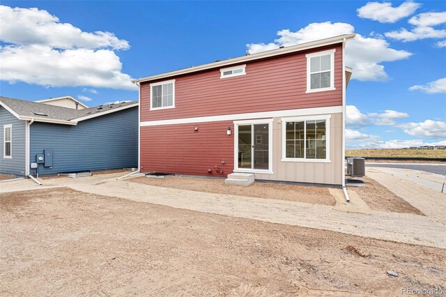 20630 E 58th Ave, Aurora, CO 80019 - rear view of property featuring central AC unit