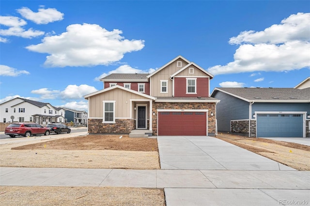 20630 E 58th Ave, Aurora, CO 80019 - craftsman house featuring board and batten siding, stone siding, concrete driveway, and a garage